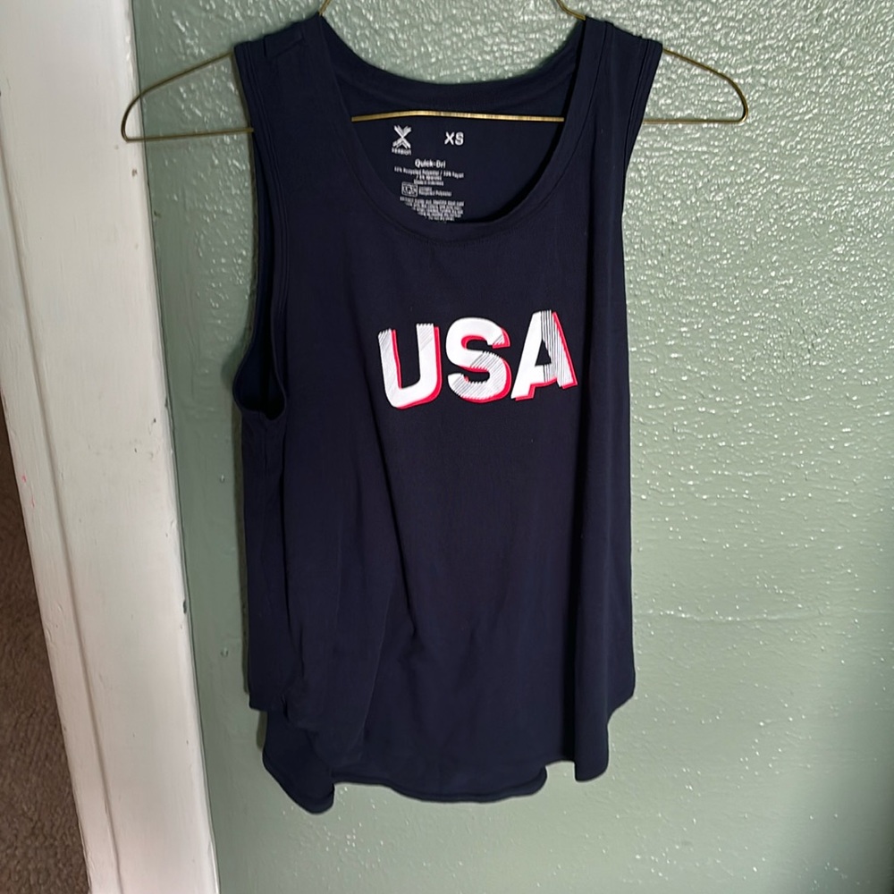 USA Tank Top is a XS but feels like a medium/small